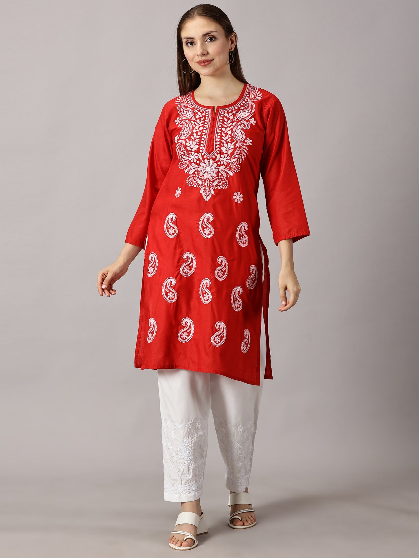 Expertly crafted with premium rayon and delicate chikankari handwork, this short top measures 32 inches in length and comes in sizes ranging from small to 3XL.