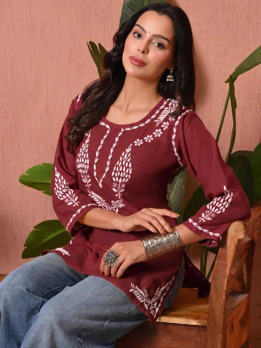 Maroon Chikankari Embroidered Cotton Short Kurti Seated View