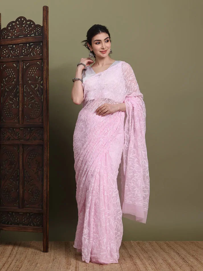 Front view of exclusive baby pink Tepchi hand-made Chikankari saree for women