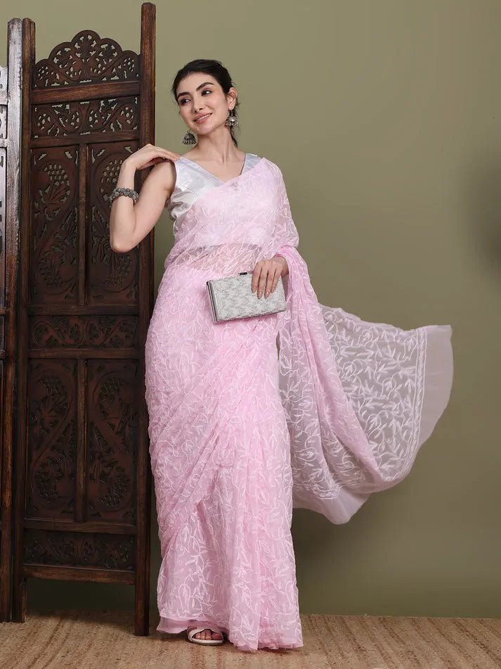 Elegant pallu display of exclusive baby pink hand-embroidered Tepchi Chikankari saree