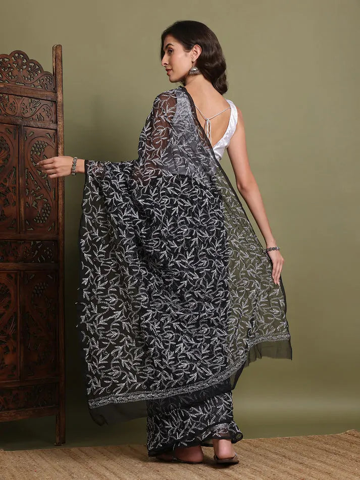 Back view of exclusive black Tepchi hand-made Chikankari saree with pallu