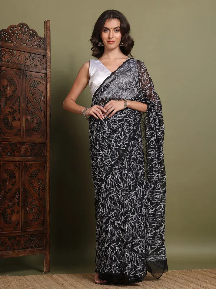 Front view of exclusive black Tepchi hand-made Chikankari saree for women