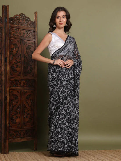 Full length view of exclusive black Tepchi hand-made Chikankari saree