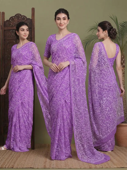 Lifestyle group view of women wearing exclusive Drak Purple Tepchi hand-made Chikankari saree