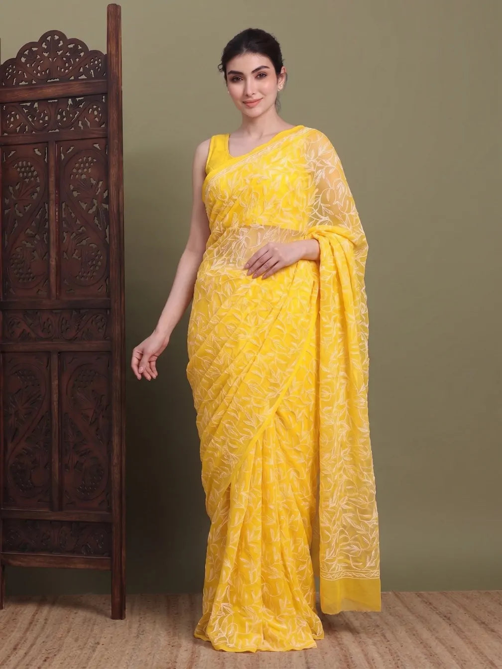 Front view of exclusive Dark Yellow Tepchi hand-made Chikankari saree for women