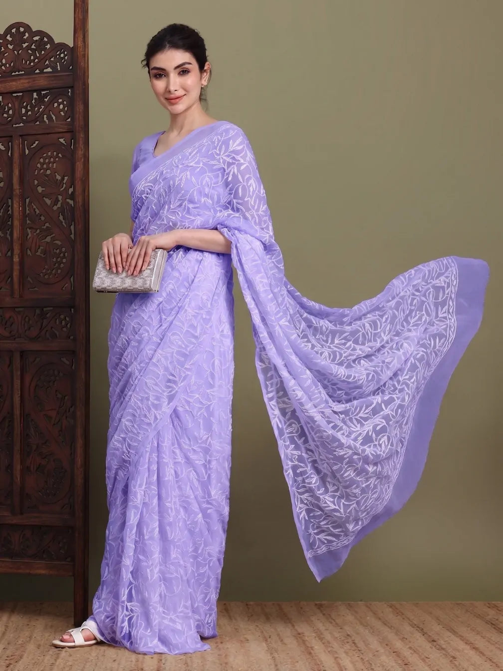 Front view of exclusive light lavender Tepchi hand-made Chikankari saree for women