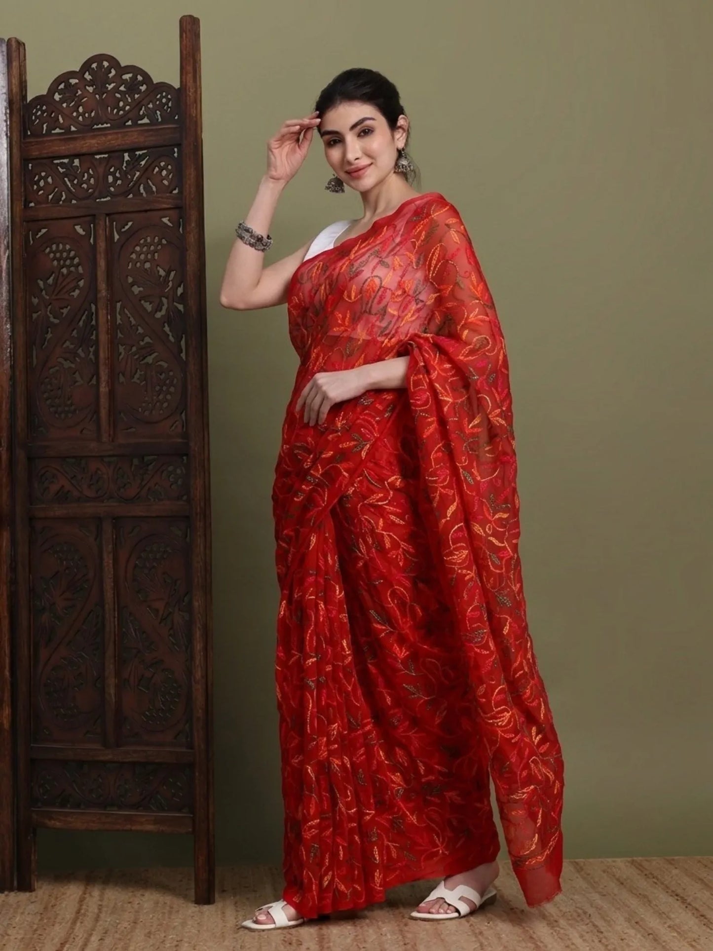 Side view of exclusive Multi Red Tepchi hand-made Chikankari saree for women