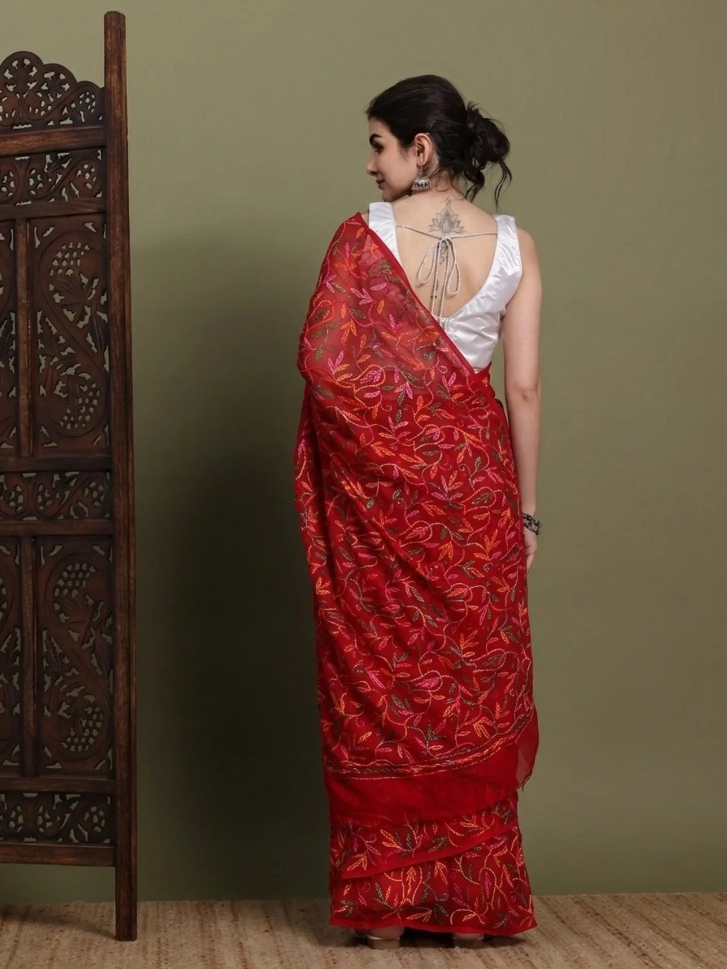 Back view of exclusive multi red Tepchi hand-made Chikankari saree for women