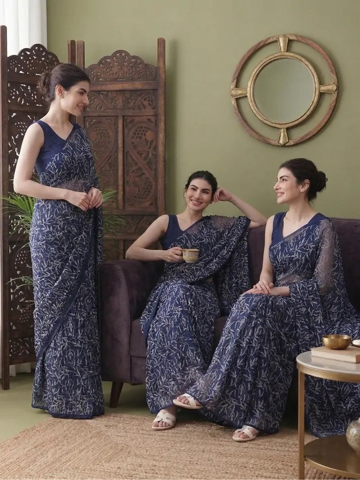 Sitting view of women wearing exclusive Navy Blue Tepchi hand-made Chikankari saree