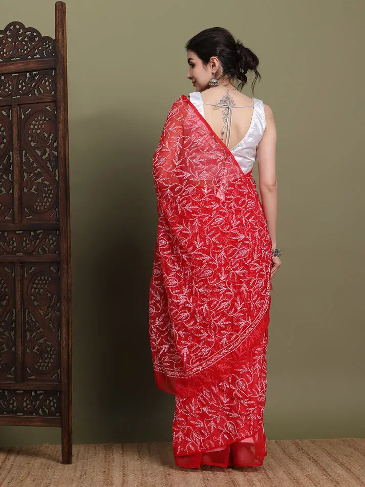 Back view of exclusive red Tepchi hand-embroidered Chikankari saree