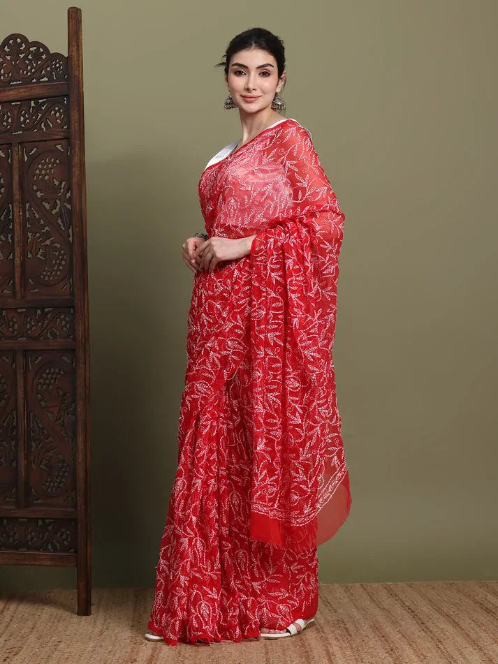 Full length view of exclusive red hand-embroidered Tepchi Chikankari saree