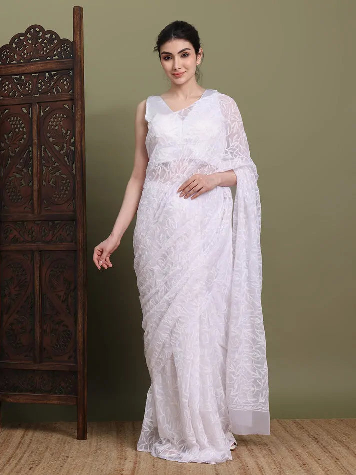 Front view of exclusive white Tepchi hand-made Chikankari saree for women