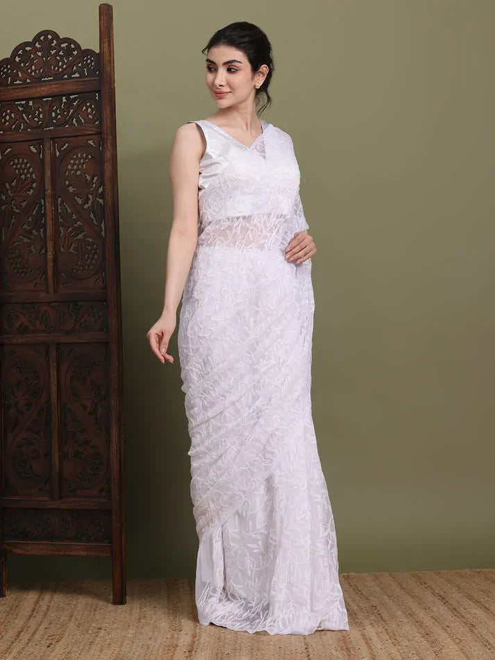 Full length view of exclusive white Tepchi hand-made Chikankari saree