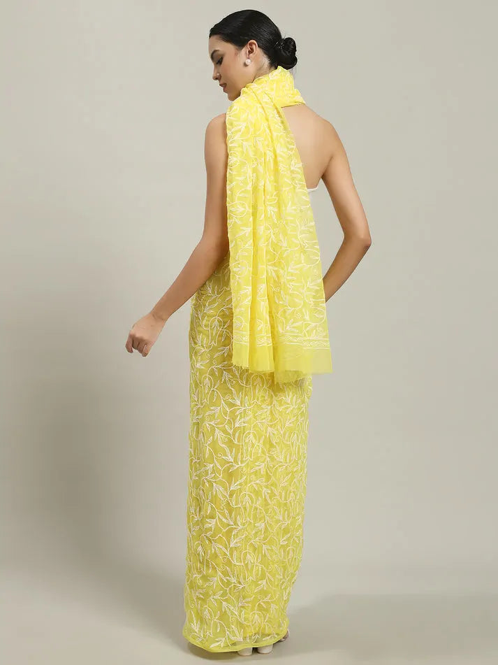 Back view of exclusive yellow Tepchi hand-made Chikankari saree with detailed pallu