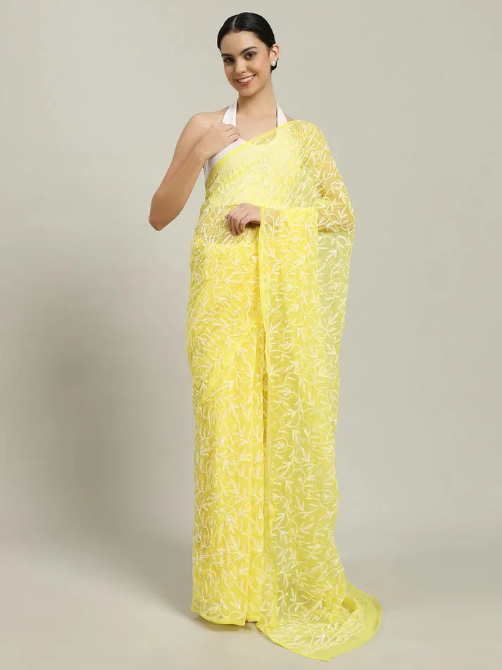 Front view of exclusive yellow Tepchi hand-made Chikankari saree for women