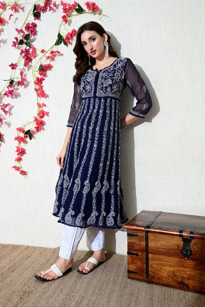 Navy blue designer embroidered kurti paired with white pants