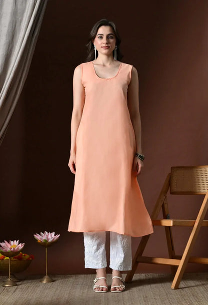Women's peach embroidered anarkali kurta set with white pants front view
