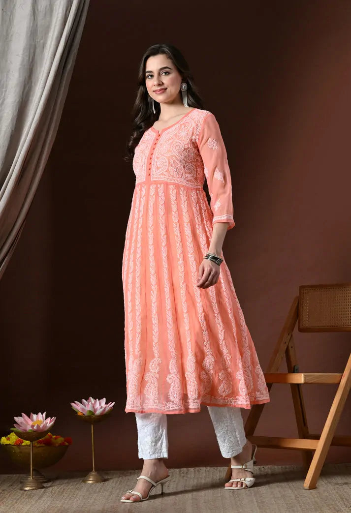 Side view of peach embroidered anarkali kurta set for women