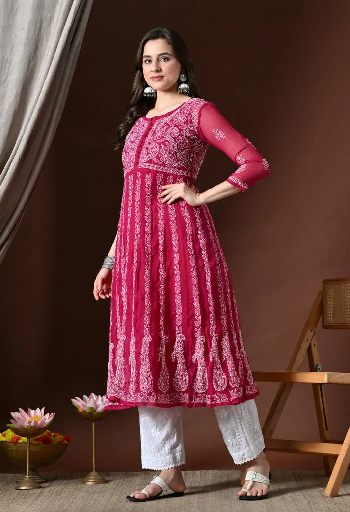 Women's pink embroidered anarkali kurta set side pose ethnic fashion