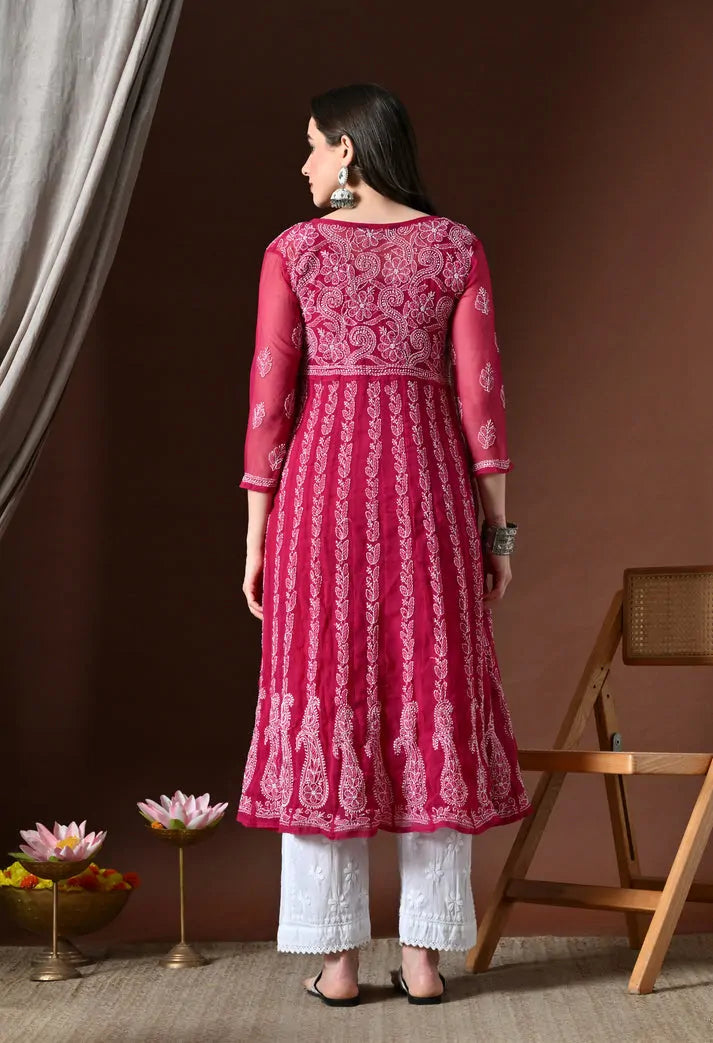 Women's pink floral print anarkali kurta set back view with white pants