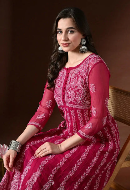 Close up view of pink embroidered anarkali kurta set for women