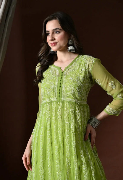 Close up portrait view of women's pistachio green embroidered anarkali kurta