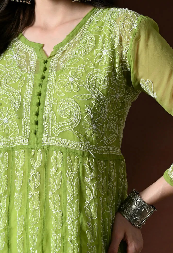 Embroidered neckline and yoke detail of pistachio green anarkali kurta