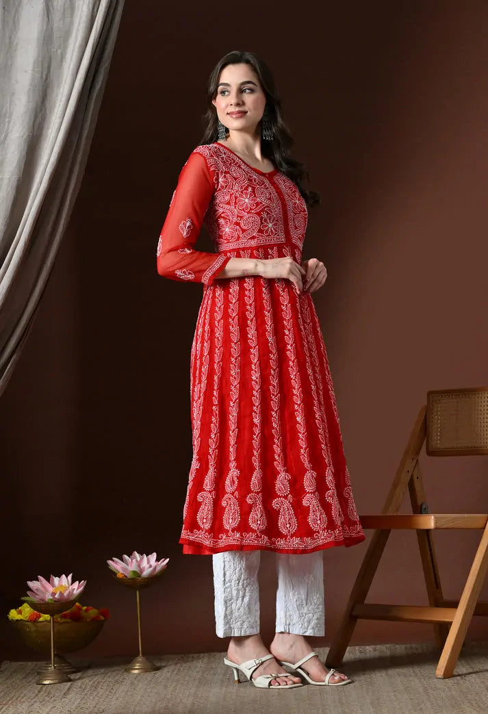 Angled view of red embroidered anarkali kurta set for women