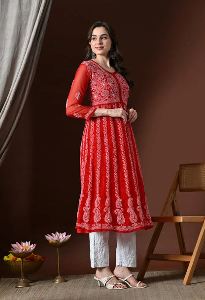 Angled view of red embroidered anarkali kurta set for women