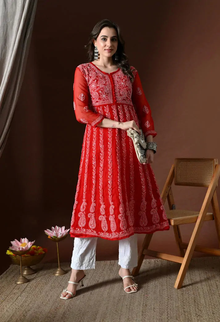 Lifestyle view of women's red embroidered anarkali kurta set