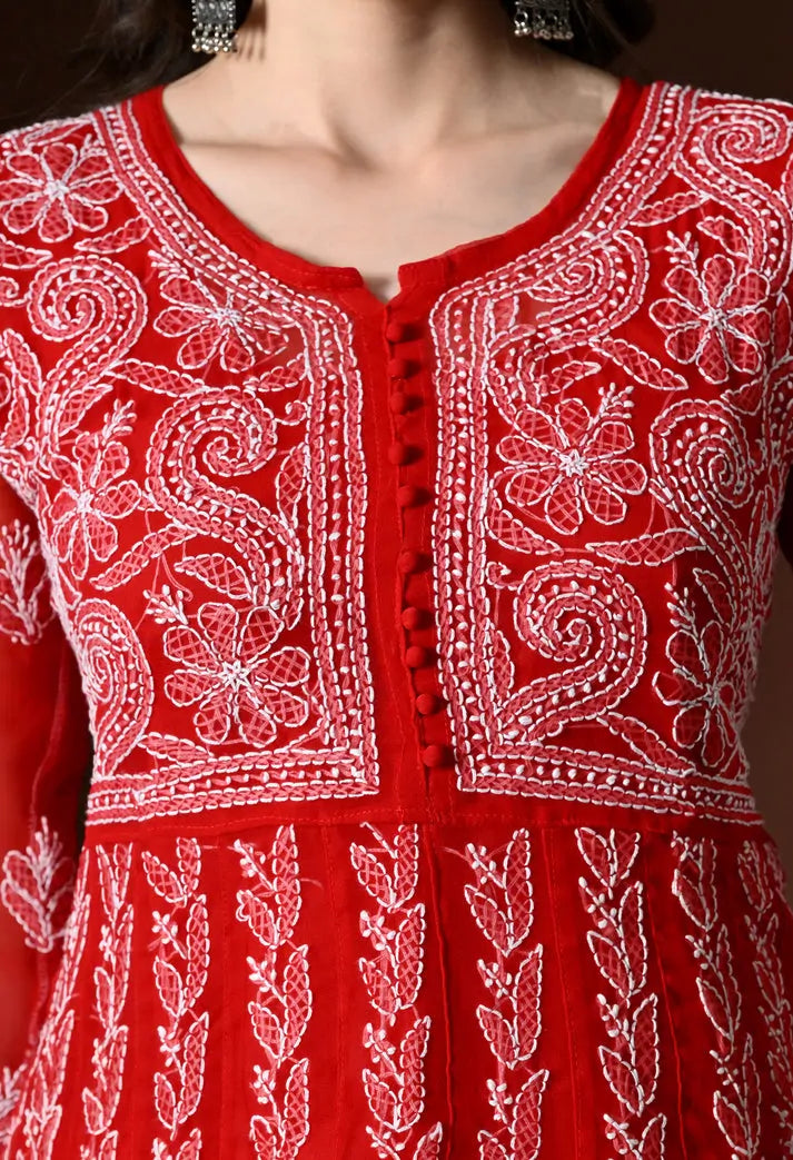 Embroidered neckline and yoke detail of women's red anarkali kurta