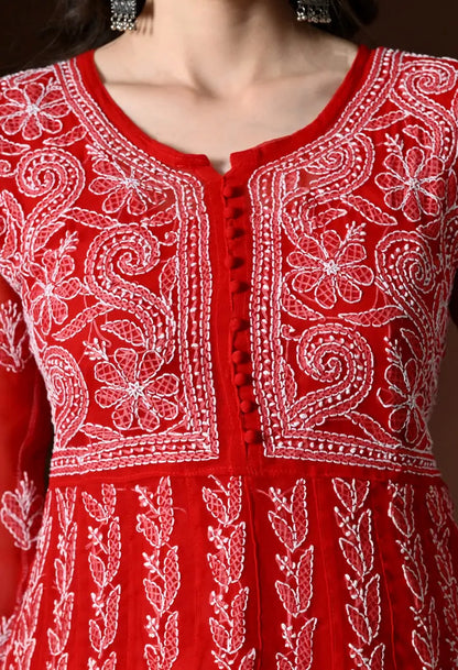 Embroidered neckline and yoke detail of women's red anarkali kurta