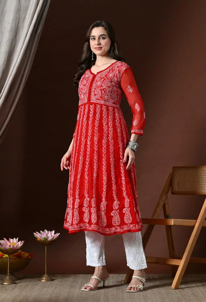 Side view of red ethnic anarkali kurta set with white pants