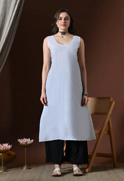 White Anarkali kurti inner slip front view with black pants