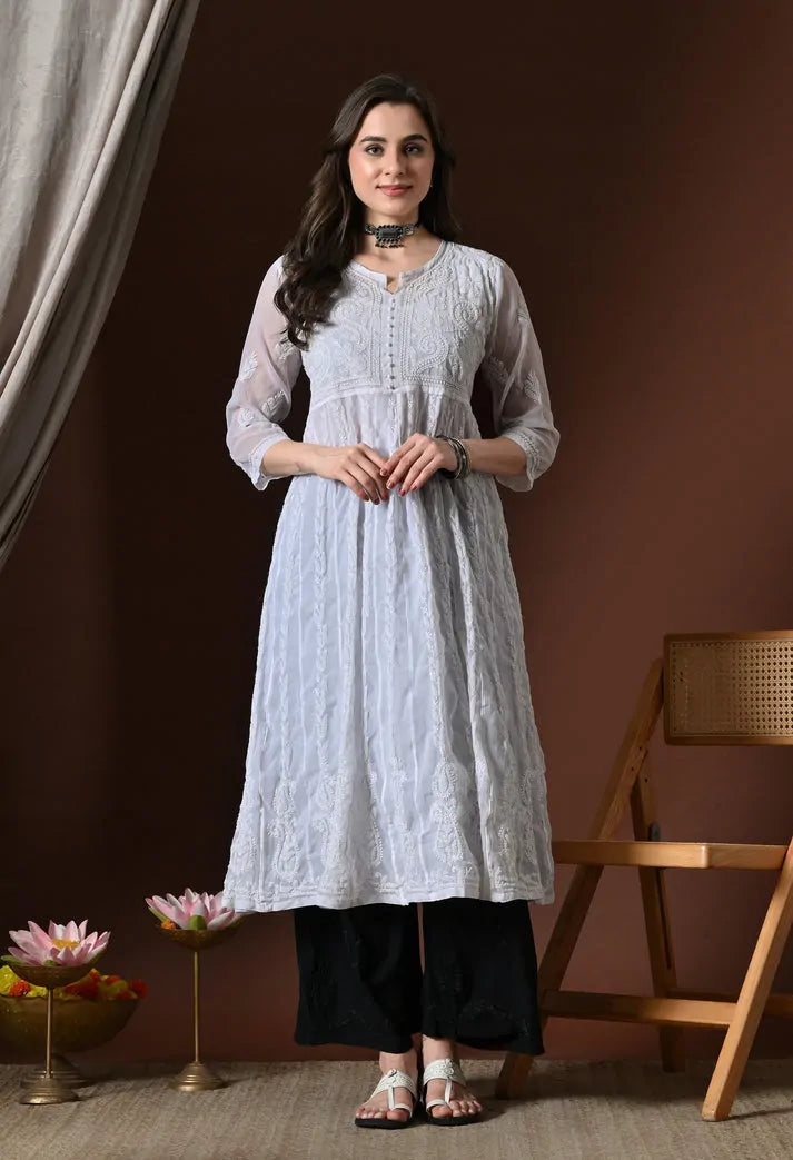 White Anarkali kurti inner slip front view with black pants