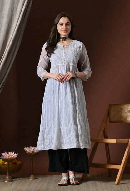 White Anarkali kurti inner slip front view with black pants