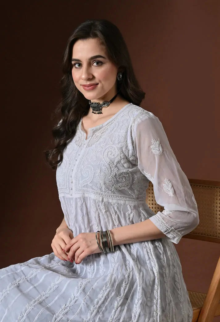 Portrait view of white embroidered Anarkali kurti for women