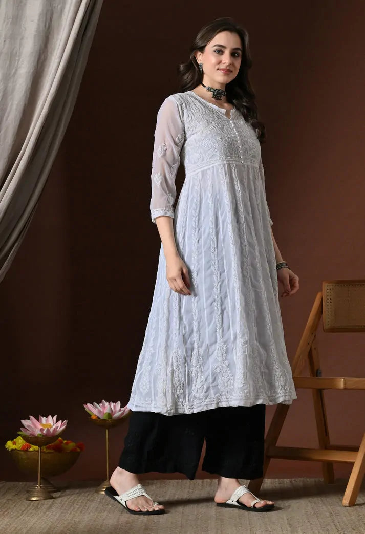 White embroidered Anarkali kurti side view with black pants