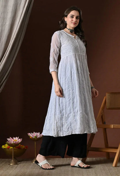 White embroidered Anarkali kurti side view with black pants